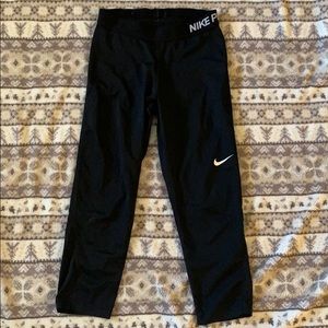 Black below the knee cropped Nike leggings